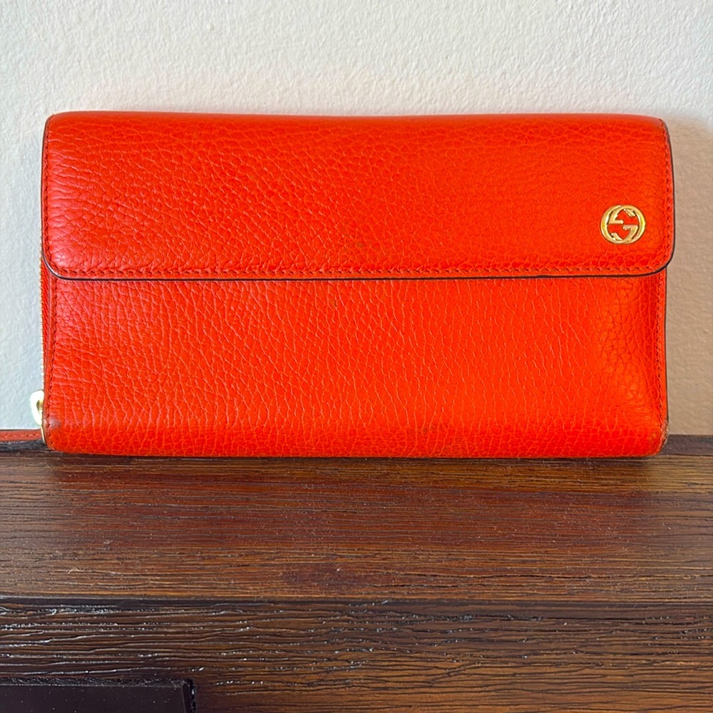 Gucci Orange Leather Wallet.